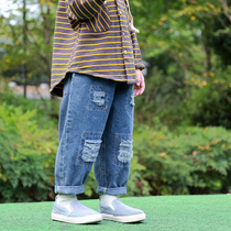 Boys  jeans spring and autumn new trousers Childrens clothing autumn Korean version of Western style childrens heavy industry washed perforated pants