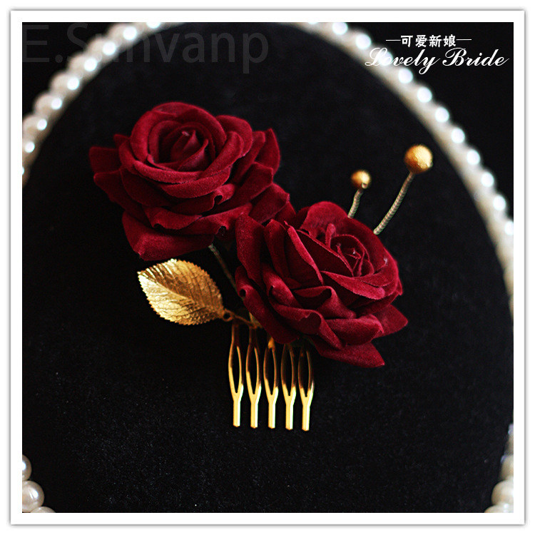 wedding dress with red roses