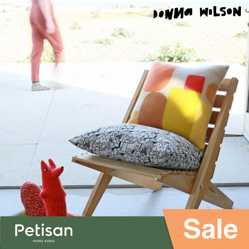 Tone tray leaning on pillow Donna Wilson UK 100% lamb wool with pillow duck fur padded knit Petisan