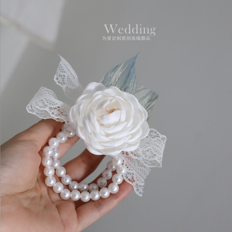 The French style meritocratic wedding wrist flower bridesmaid's sister group hand ring pearl handmade bride to marry flower mountain tea flower bud