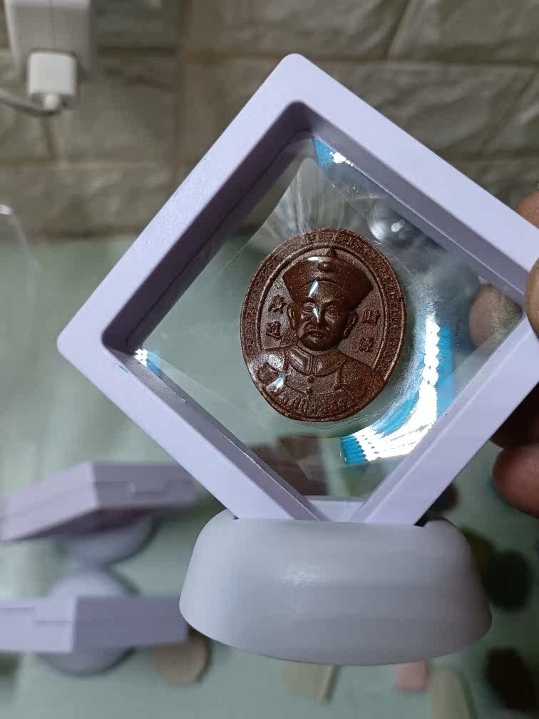 Two Gothic Buddhas in physical swing with pendant Buddha number 00024