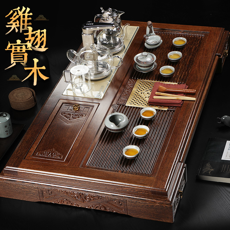 Divine carved chicken wing wood tea tray home tea table fully automatic water four-in-one electrical set oversized kung fu tea set