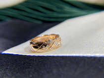 With a drilled coco wind ring of crush diamond grandma style