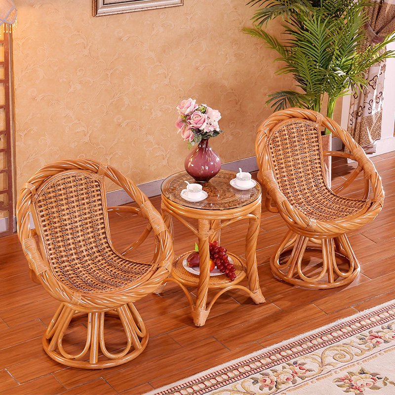 Outdoor natural rattan chair three-piece set rotating single old-fashioned balcony table and chair pure Teng woven leisure chair coffee table combination