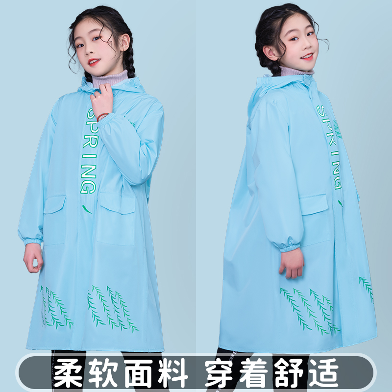 Children and boys with children in raincoat and children in primary school with bookbags and young children attending school waterproof and thick raincloth