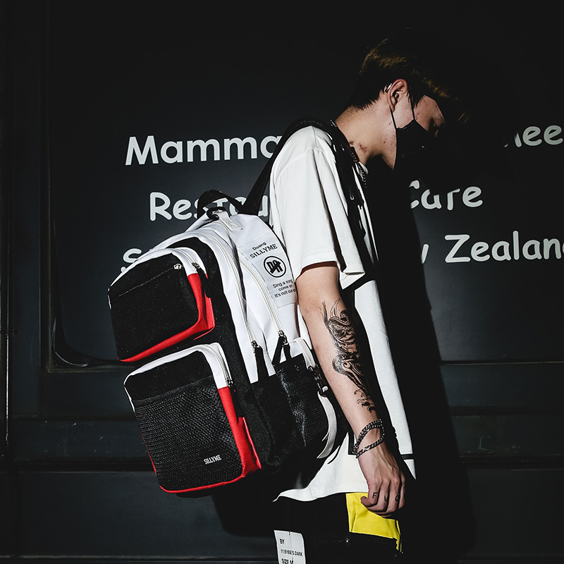 Backpack men's fashion trend personality canvas simple tide backpack Europe and the United States street hip-hop female large-capacity student bag
