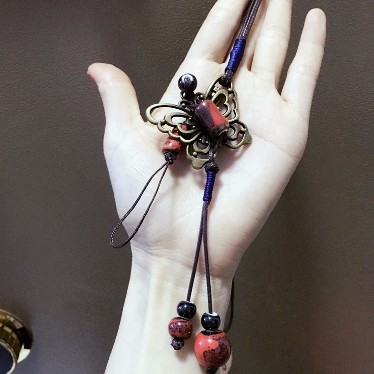 Handmade retro điện thoại di động mặt dây chuyền có thể tháo rời áo len chuỗi mặt dây chuyền mặt dây chuyền Apple điện thoại di động phổ quát dài treo cổ nữ - Phụ kiện điện thoại di động kẹp điện thoại trên ô tô
