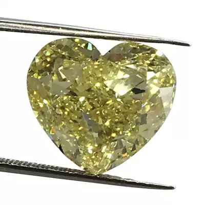 Colored diamonds yellow diamond heart 10 03 karat FancyBrownishYellow lottery yellow brown GIA certificate