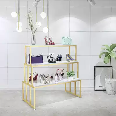 Creative light luxury clothing store Zhongdao display table shoe bag shelf flower shop display stand Golden women's clothing children's clothing running water table