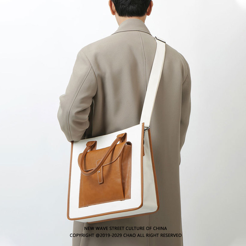 Skew satchel men's leather handbag handheld small crowdcommuter bag male Korean version of the new single shoulder special Postbag Female Large capacity