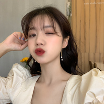 Bow long tassel pearl pendant earrings autumn and winter round face temperament goddess fan senior sense earrings earrings tide