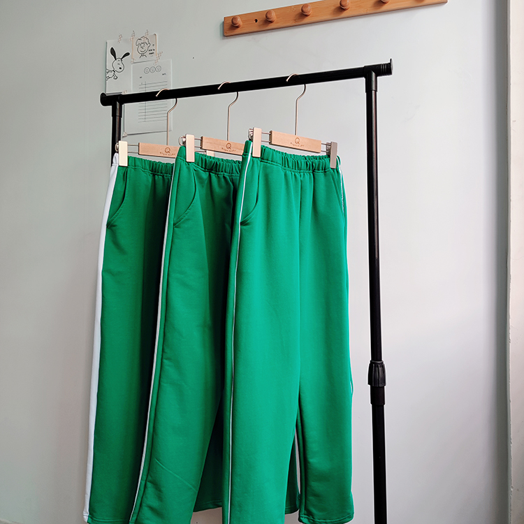 Qi Yating green school uniform pants spring and autumn thin section two bars white side one bar male and female primary and secondary school students sports trousers