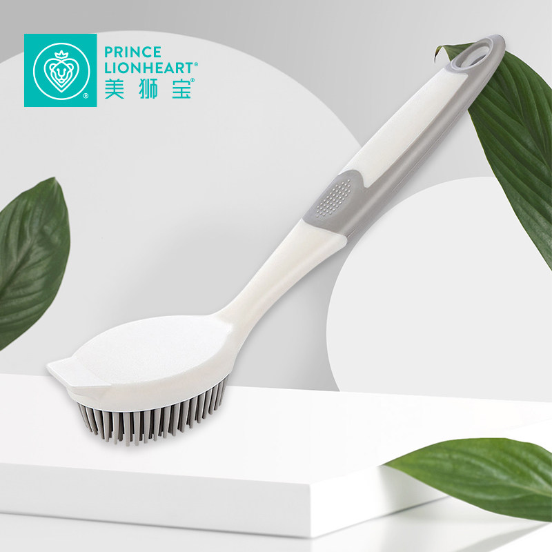 Prince Lionheart uses a cleaning brush to | a soft glue brush to clean the surface of the footstool bathtub chair