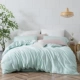 LOVO nhà dệt giường bốn mảnh tái sinh sợi cellulose màu rắn thời trang duvet cover ga trải giường 1,5 / 1,8 mét giường - Bộ đồ giường bốn mảnh