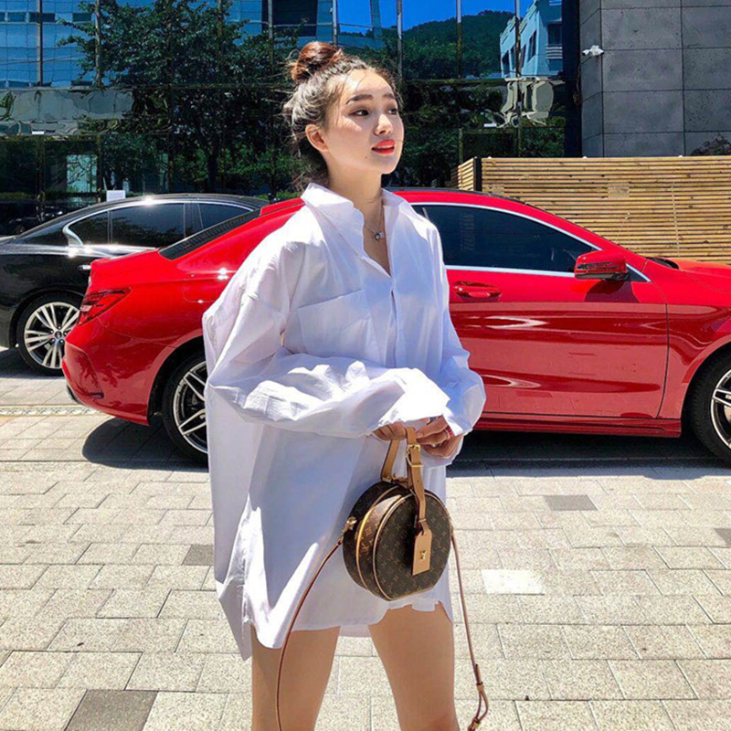 Spring and autumn 2020 new Korean version of the BF style white shirt long version of the tail swing all-match casual fashion pure white outer wear