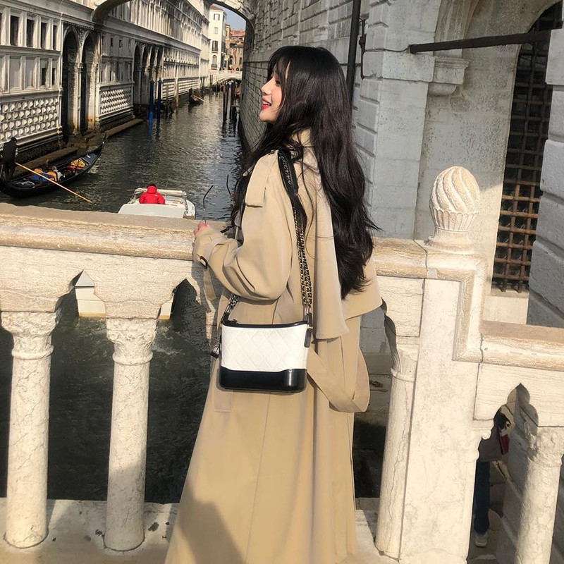 Windbreaker women's medium and long version spring 2022 early spring new net red waitmore student temperament popular Korean version coat women