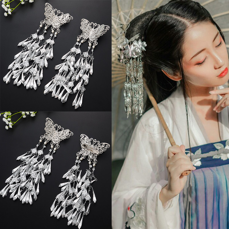 Ancient costume Hanfu headdress retro hair accessories long version multi-layer small fresh tassel jewelry imitation Miao silver insert comb butterfly step shake