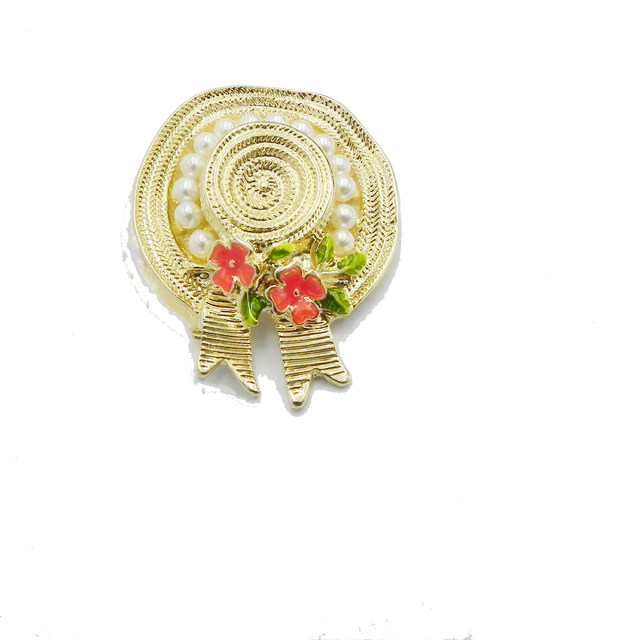 ເຄື່ອງປະດັບ Qingdao retro ໃຫມ່ versatile enamel glaze bow inlaid ກັບ pearl gold hat brooch suit ພ້ອມສົ່ງ