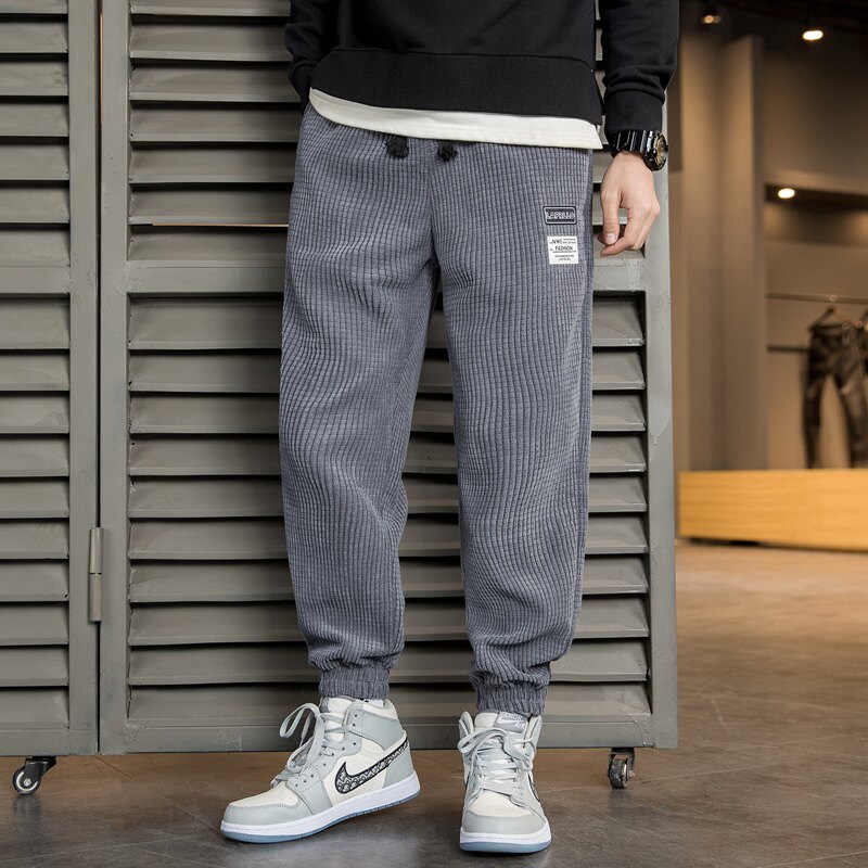 Tide brand corduroy casual pants men's Korean version of the trend loose feet sweatpants all-match solid color beam feet harem long pants