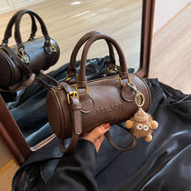 Bucket-shaped backpack womens new high-end texture niche autumn and winter retro single shoulder crossbody bag womens portable cylinder bag