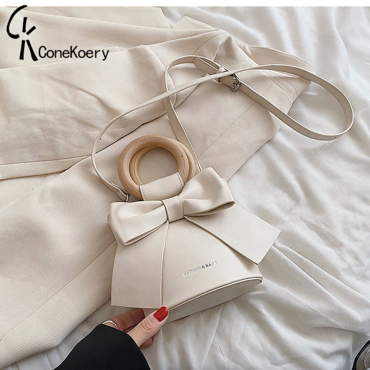 France Cone Koery leather butterfly knife in 2022 summer tide new popular slug bag bag