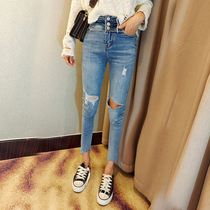 Handsome and thin spring and summer new elastic high waist drain button 90% denim pants woman big broken hole soft and small leggings