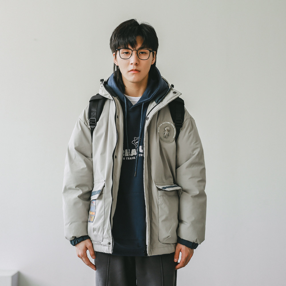 Hey Ma Seven as a winter collage for winter collage, a male car with a cap, and a thickened casual coat damp in a cotton suit.