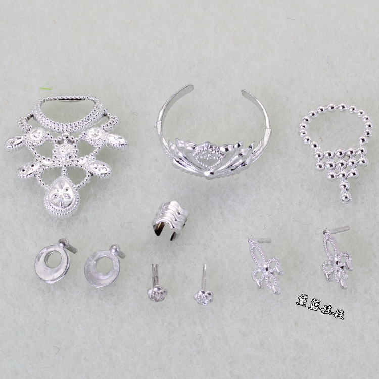 barbie head earrings