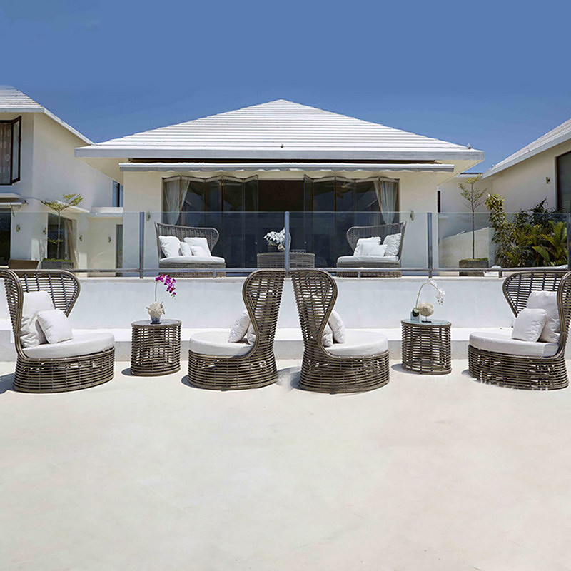 Nordic outdoor sofa creative rattan sofa single designer courtyard balcony living room leisure sofa coffee table