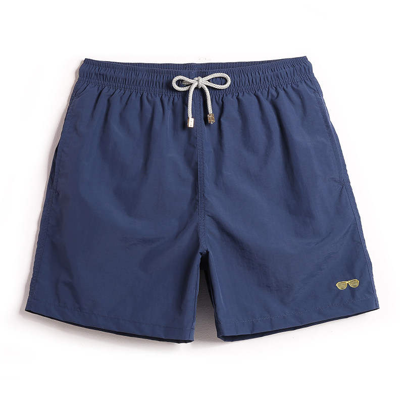 Quick-drying loose beach pants men's tide brand solid color 4-point shorts Seaside resort water park anti-embarrassment swimming trunks