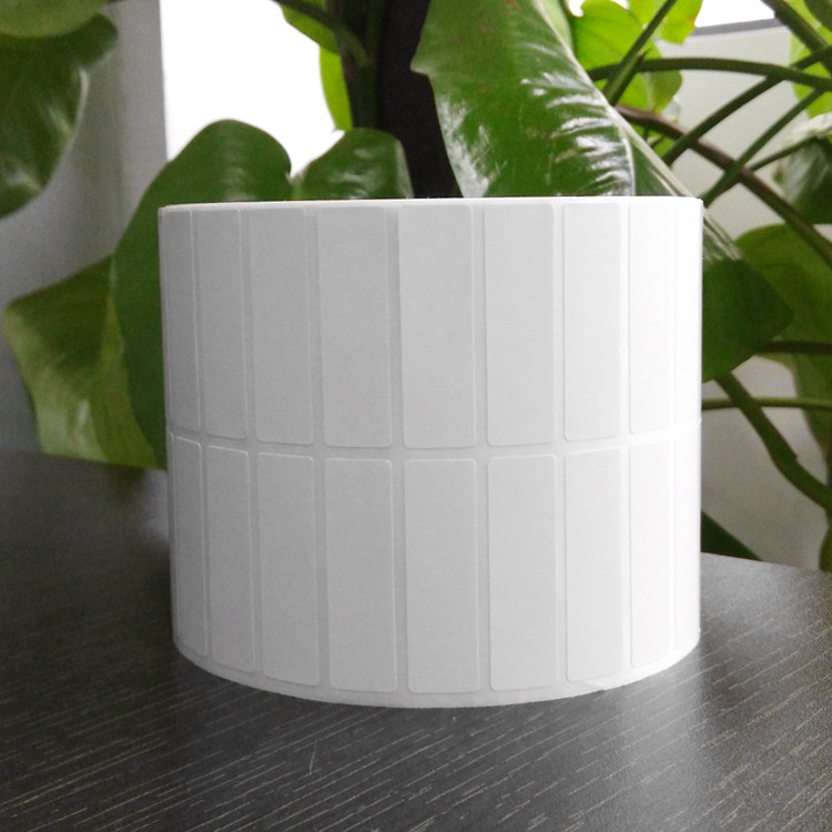 Imported UL bright white PET tag paper 45*12*5000 high viscosity bar code non-adhesive water and tear sticker