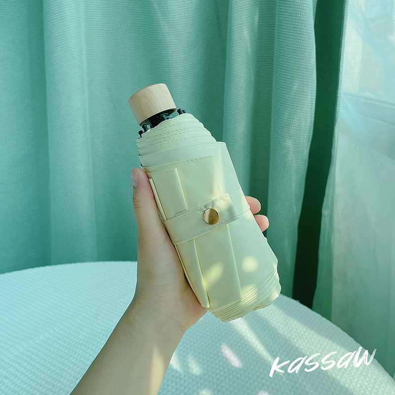 ins cream wooden handle sun umbrella women's folding umbrella sunny and rainy dual-use anti-ultraviolet small portable sunshade