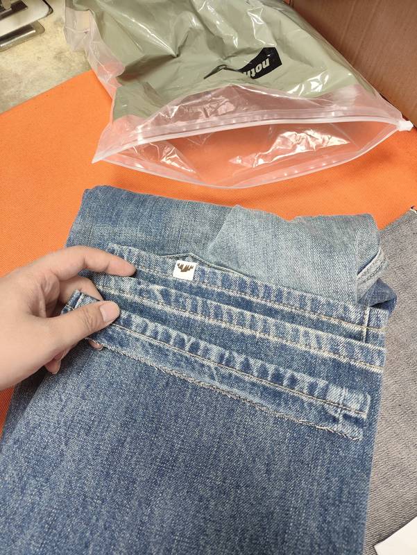 Jeans Are Modified to Lengthen Them, Restoring the Original Wash, with Distressed Edges, Washed, Aged, and Faded