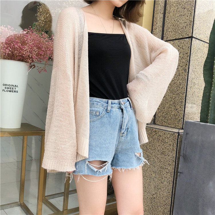 Red thin air conditioning sweater hollowed knitted shirt summer Han edition lazy wind short sunscreen coat