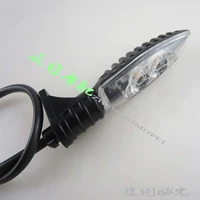 Спереди слева