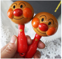 Exported to Japan original single bread Superman sand hammer Bell baby baby hand Bell Bell sand drum instrument early education toy