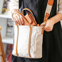 Xiao Sheng has a rice Japanese single shoulder canvas bag female with leather small handbag literary leather bag
