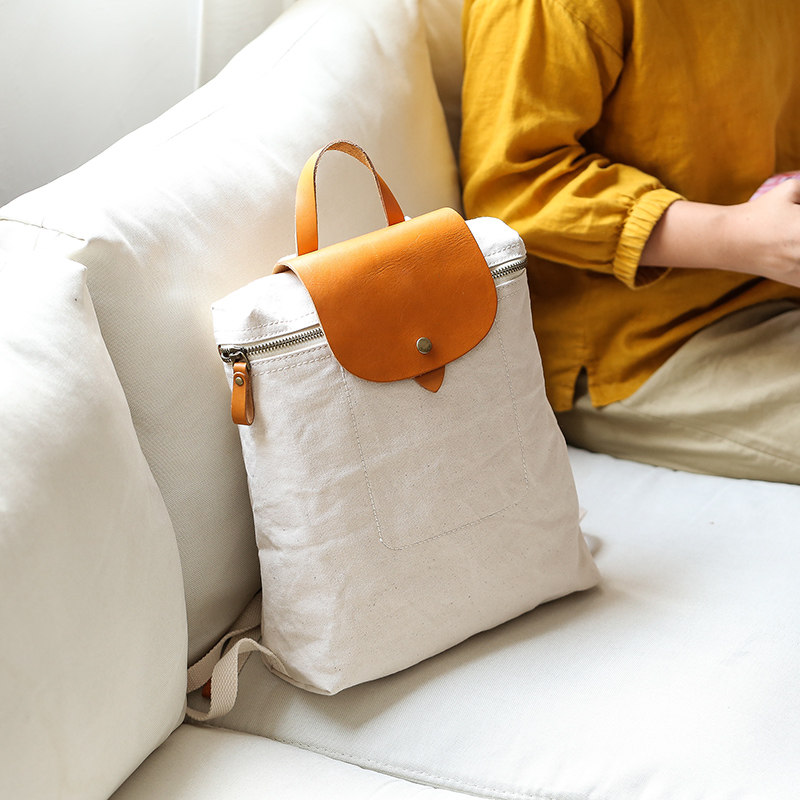 Xiaosheng has rice canvas backpack women's small bag trendy casual all-match schoolbag women's mini small backpack Mori women's bag