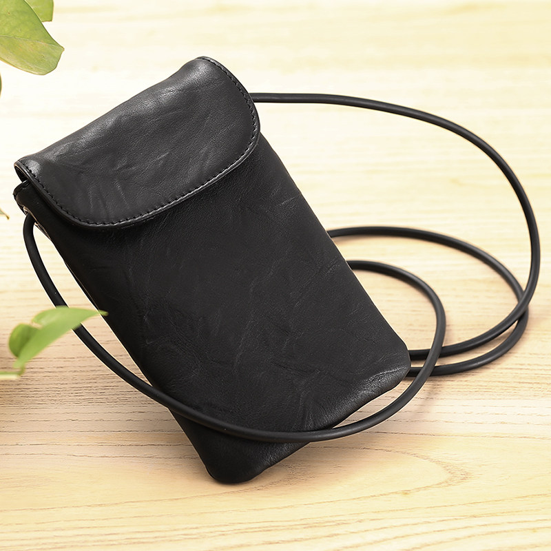 Xiao Shi has a mi leather mobile phone bag female slanted mini-vertical single shoulder bag lady simple bag
