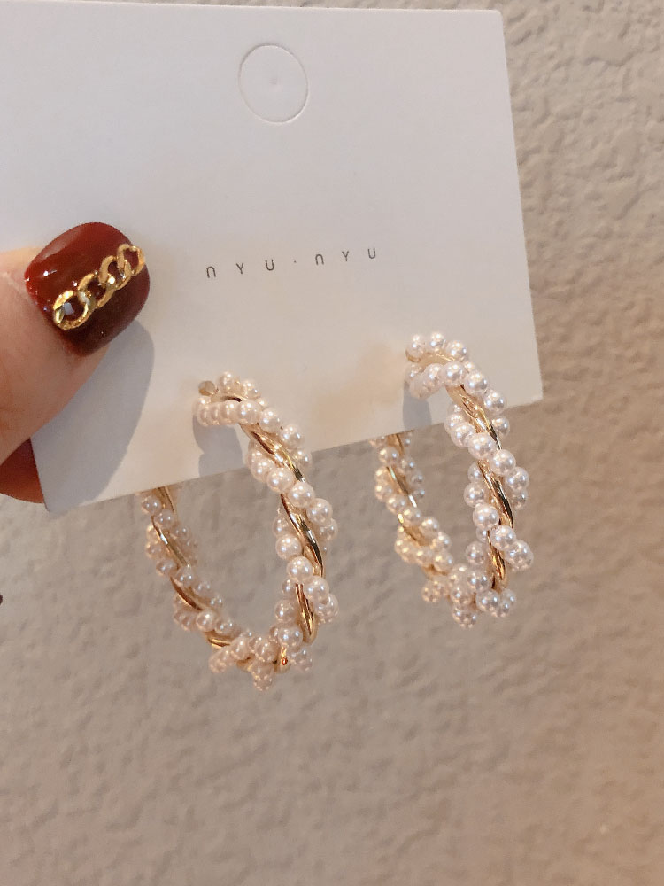 Earrings 2022 new trendy Korean niche pearl earrings winding big earrings women's French net red high-end sense earrings