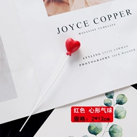 Красный воздушный шар в форме сердца