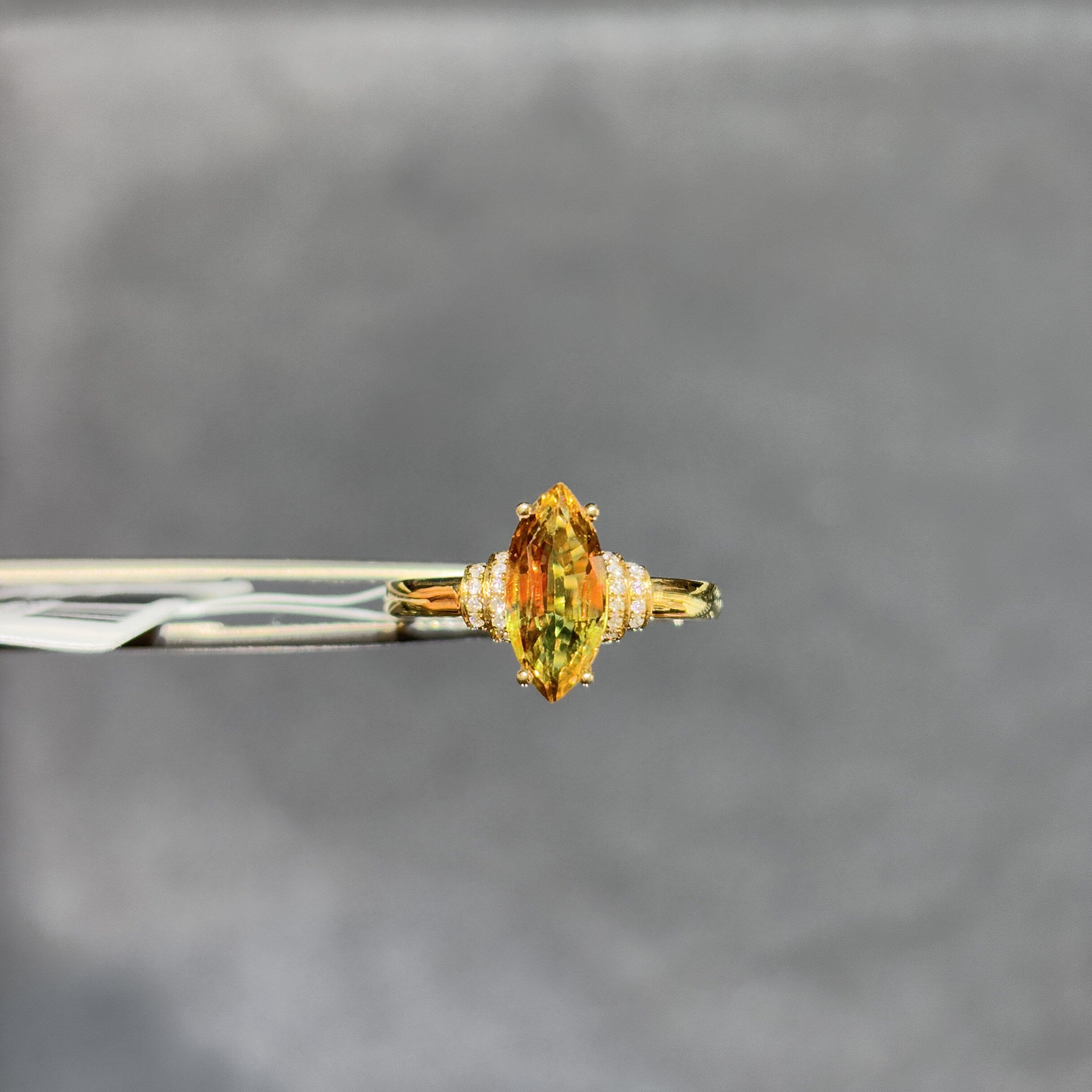 18K gold natural orange sapphire ring with diamonds