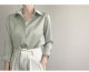 High-quality green satin shirt women's spring and autumn professional shirt design sense niche chic top 2022 new trend