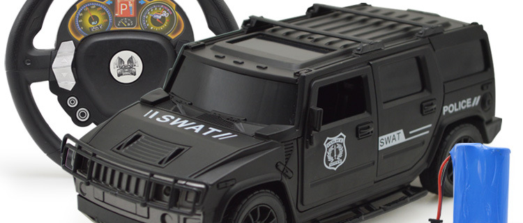 Tay lái cảm biến trọng lực điều khiển từ xa xe cảnh sát một nút để mở cửa Hummer off-road trẻ em sạc xe đồ chơi điện - Đồ chơi điều khiển từ xa đồ chơi cho trẻ 1 tuổi