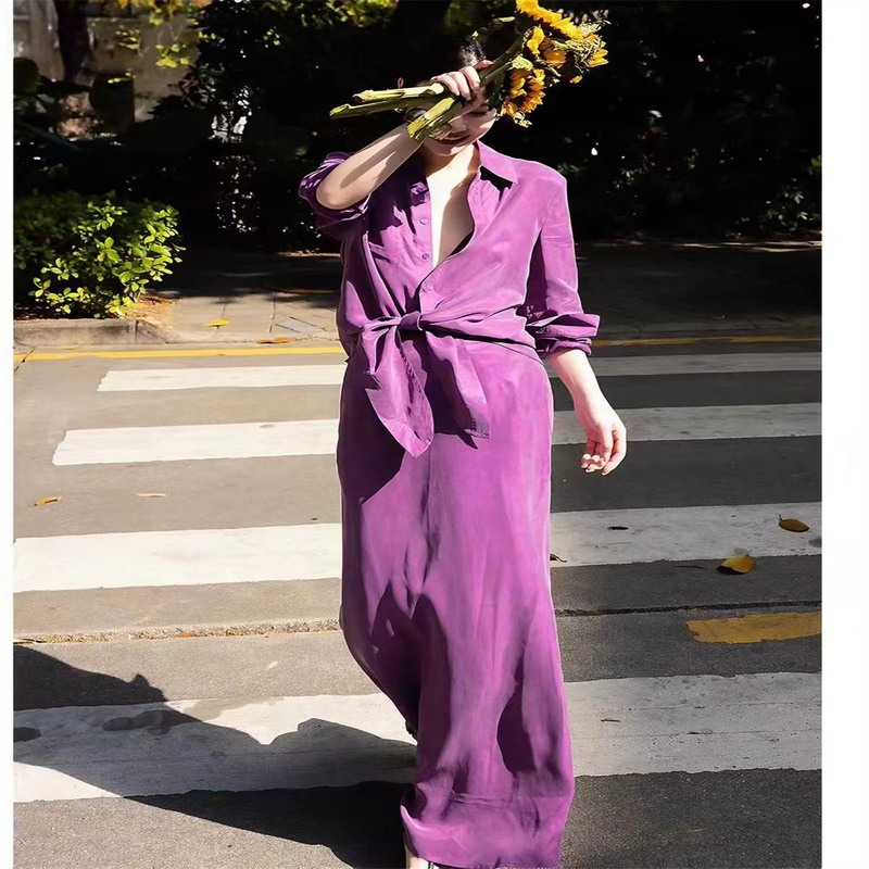The New Copper Ammonia Silk Purple Shirt Set from the Boutique Is a Fashionable and Stylish Loose-Fitting Shirt and Skirt Two-Piece Set for Spring and Summer The New Copper Ammonia Silk Purple Shirt Set from the Boutique Is a Fashionable and Stylish Loose-Fitting Shirt and Skirt Two-Piece Set for Spring and Summer