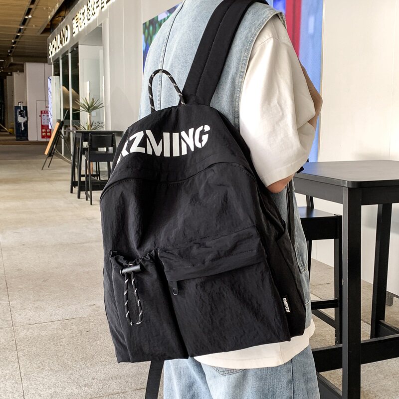 Backpack for men and women casual simple style sports travel backpack student school bag large capacity lightweight waterproof backpack