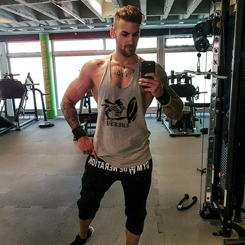 New nam thể dục thể thao thể hình lỏng lẻo vest cotton thấm mồ hôi kích thước lớn Khiên Spartan áo ba lỗ nam form rộng
