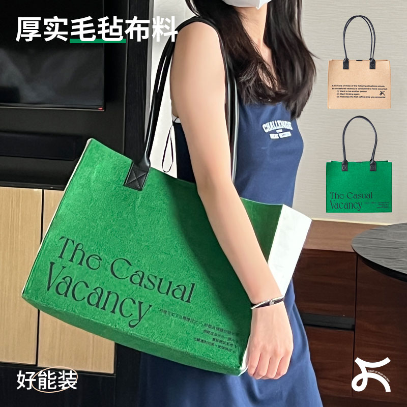 Left Xiangdong Couple vacancy Tot package original design commutes large capacity in wind single shoulder large pack female