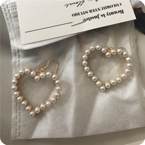 Korean earring temperament Net red exaggerated hollow retro big love heart sweet pearl earrings female heart ear clip
