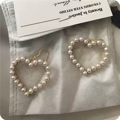 Korean earring temperament Net red exaggerated hollow retro big love heart sweet pearl earrings female heart ear clip